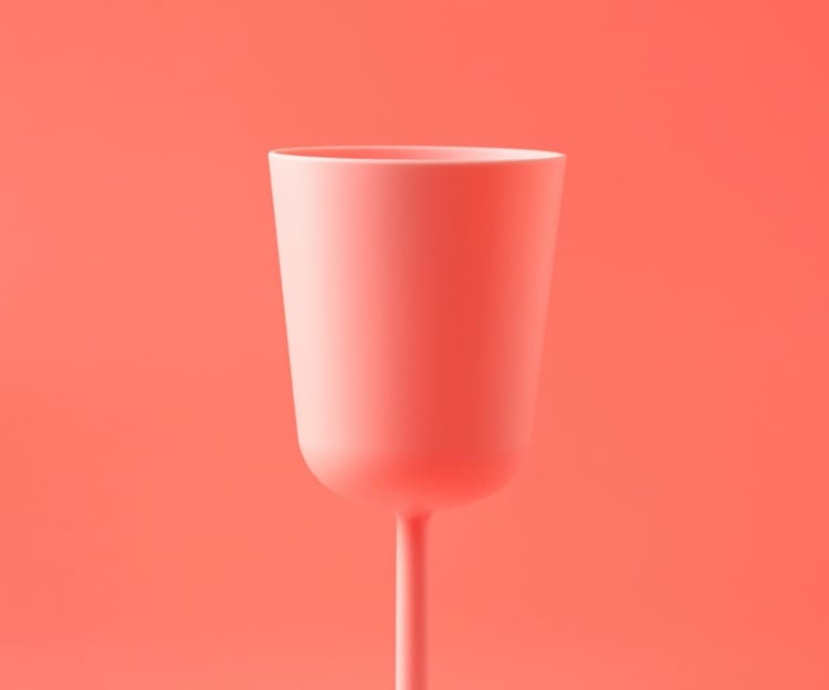 Martini glass in pink background